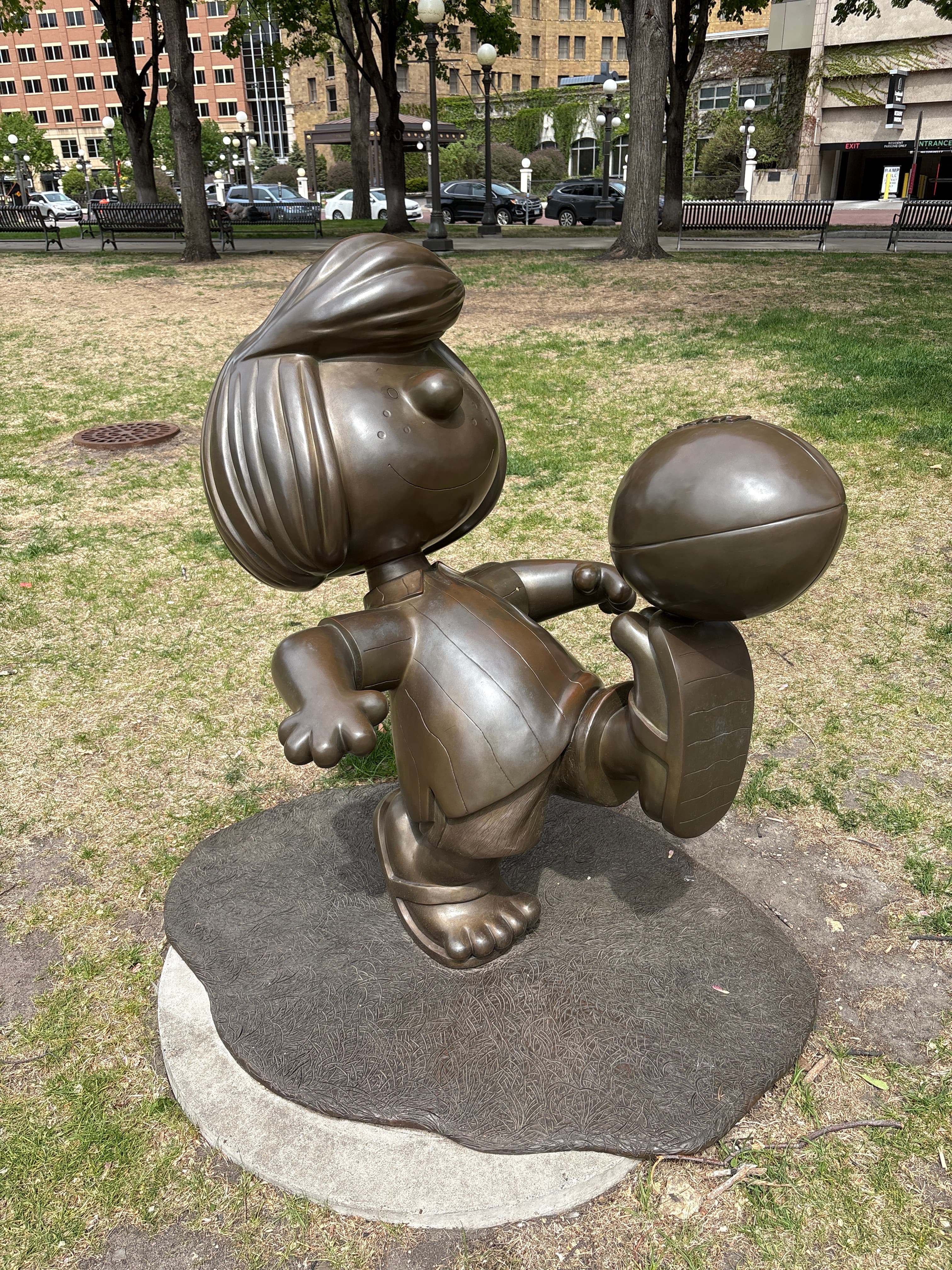Peppermint Patty kicking a football